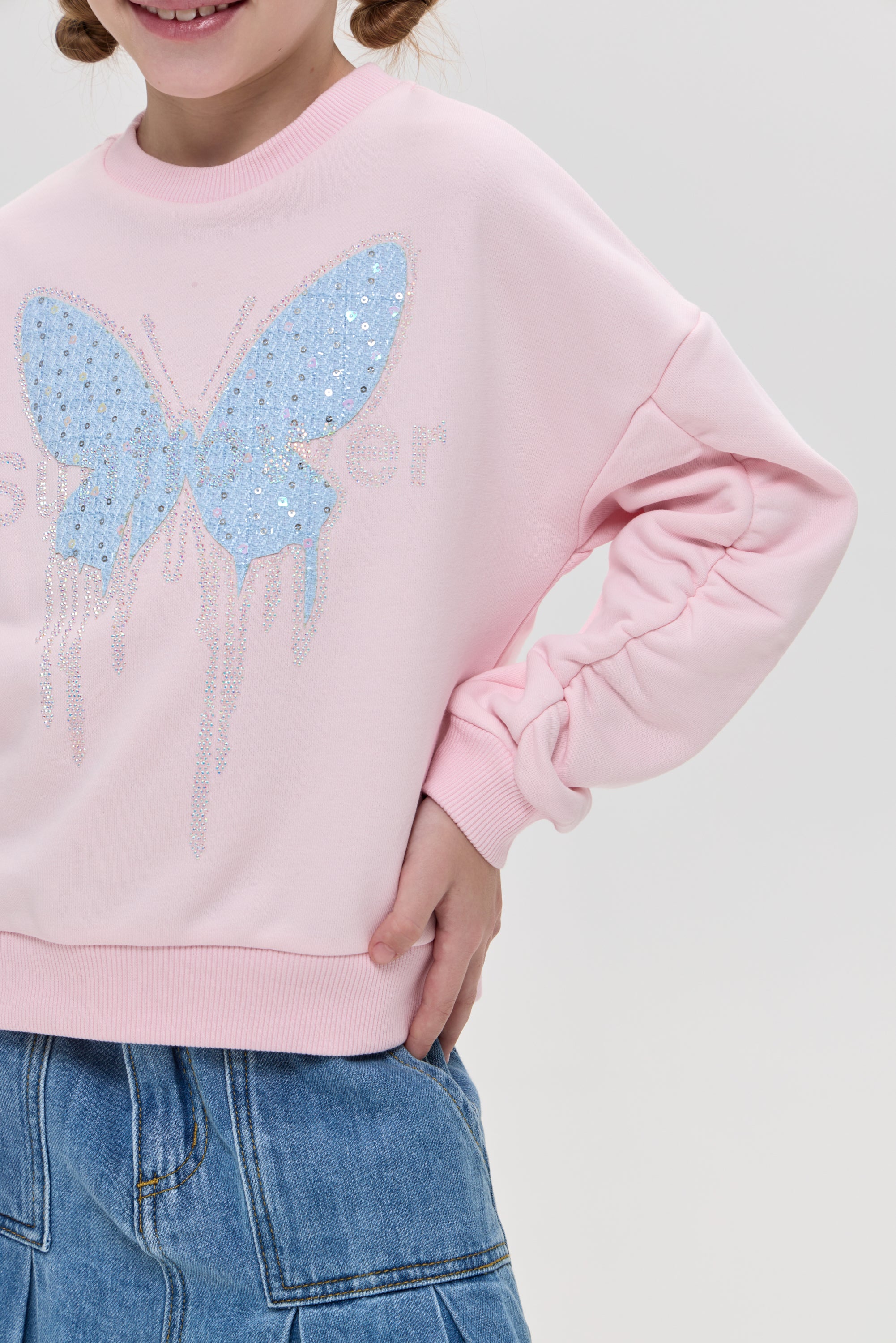 Sweatshirt with butterfly application