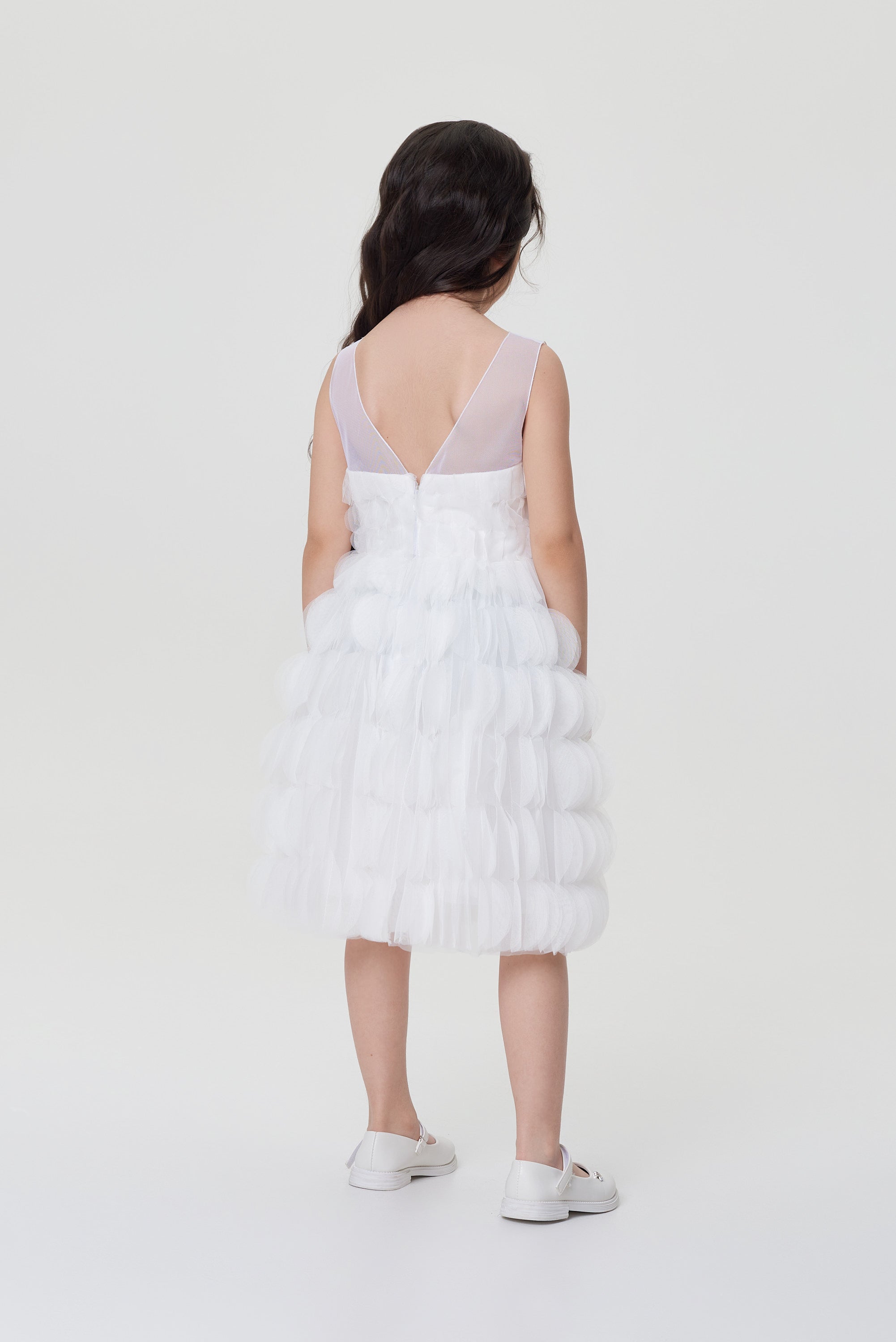 White dress with a black bow belt