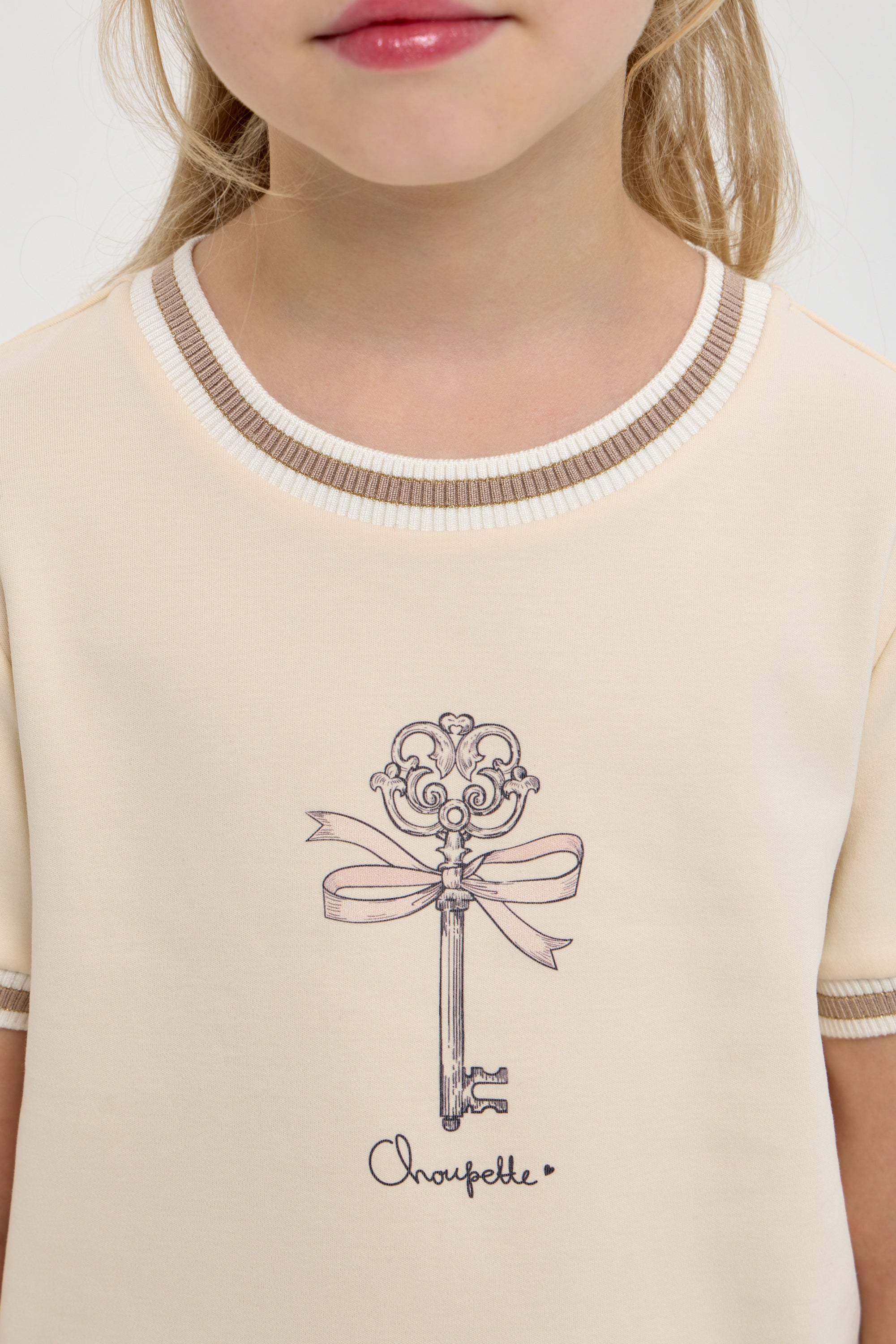 Beige T-shirt with the key print