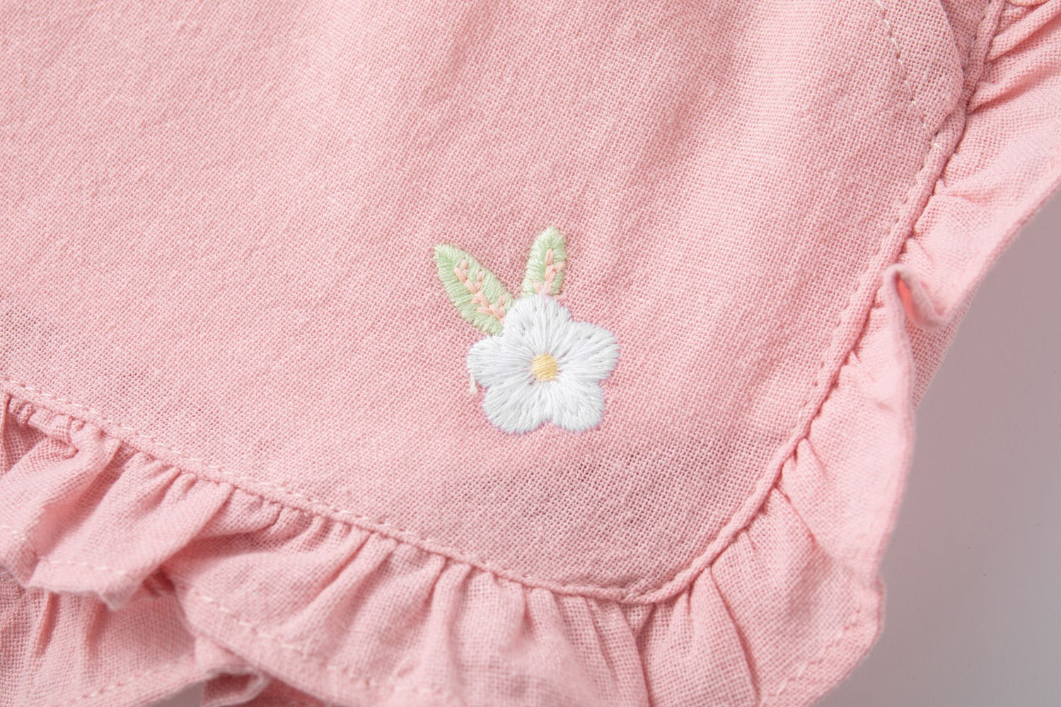 Pink cotton shorts with ruffles
